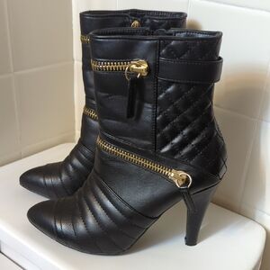 Chic Black Quilted Heeled Boots with Gold Zippers